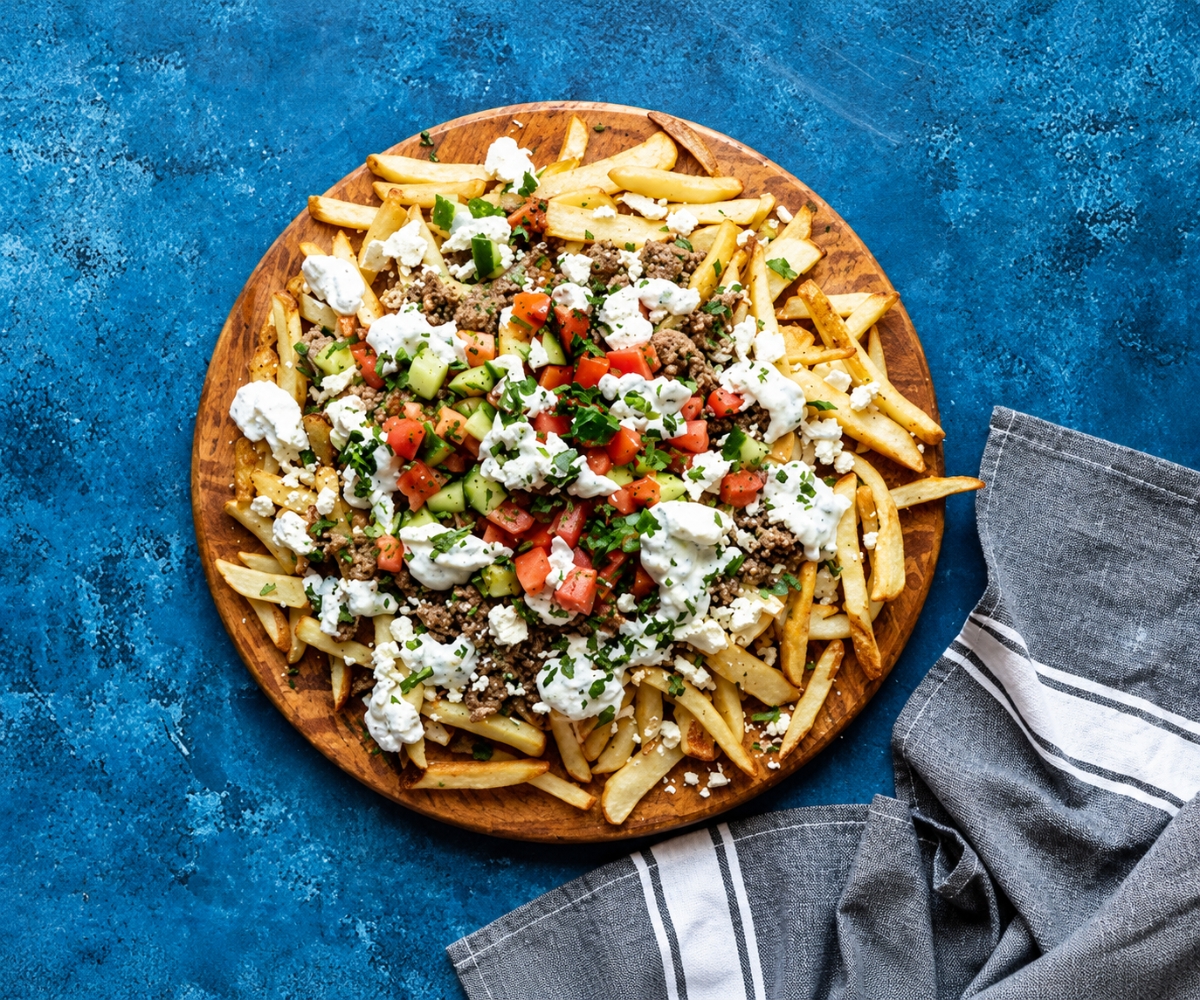 Loaded fries with toppings and sauce
